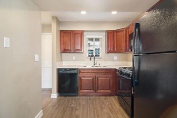 Black appliance package with gas range